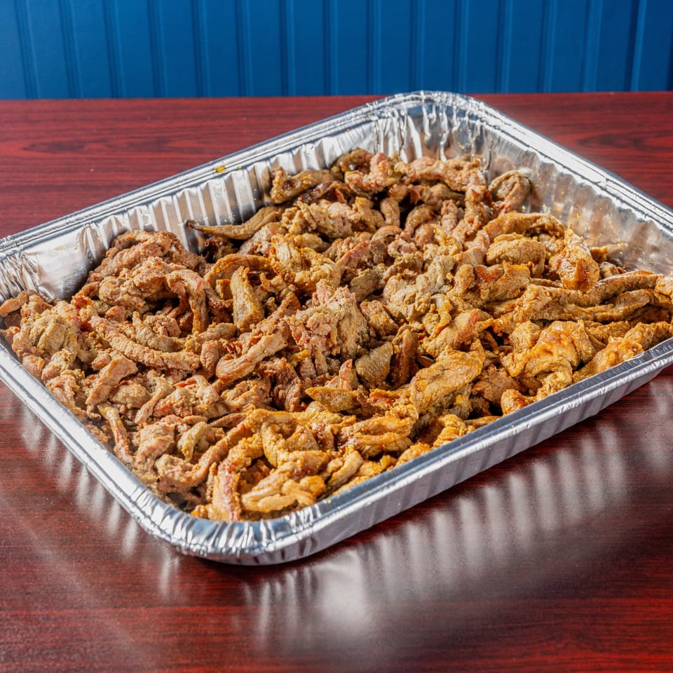 Tray of seasoned beef.